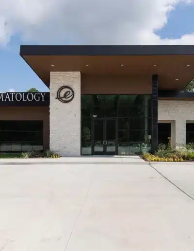 Wide front view of Elite Dermatology medical clinic building and front entrance in Kingwood. Wide front view of Elite Dermatology medical clinic building and front entrance in Kingwood.