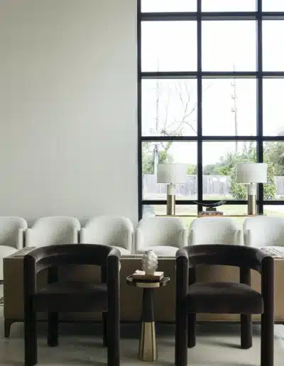 Bright, spacious main lobby with floor-to-ceiling window grid and plush seating at Elite Dermatology. Bright, spacious main lobby with floor-to-ceiling window grid and plush seating at Elite Dermatology.